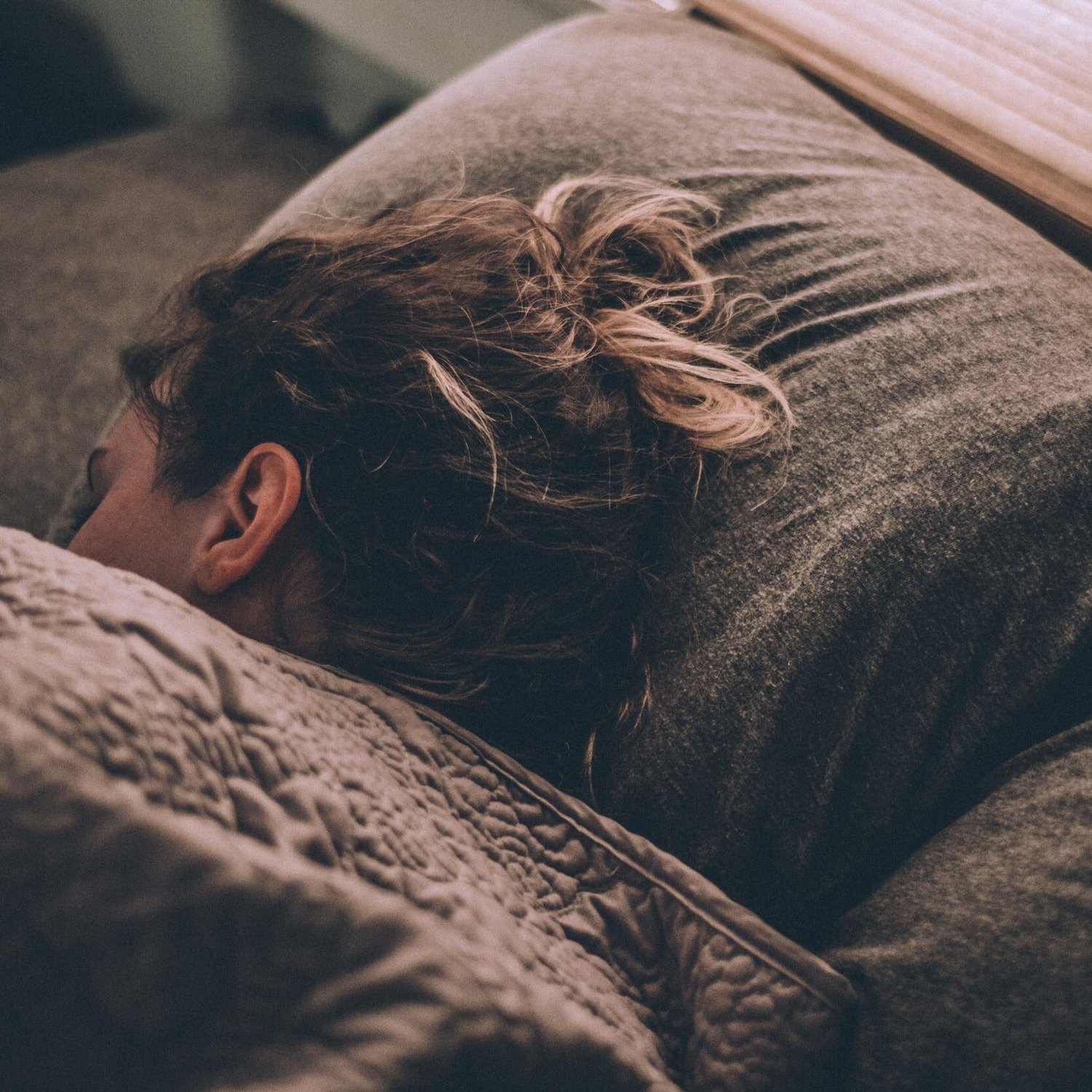 A person resting in bed